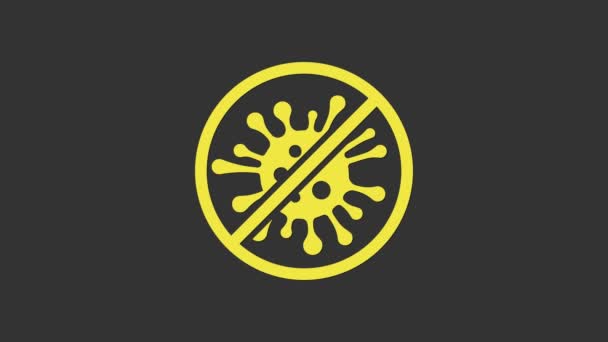 Keltainen Stop virus, bakteerit, bakteerit ja mikrobi ikoni eristetty harmaalla pohjalla. Antibakteerinen ja antiviraalinen puolustus, suojainfektio. 4K Video motion graafinen animaatio - Materiaali, video