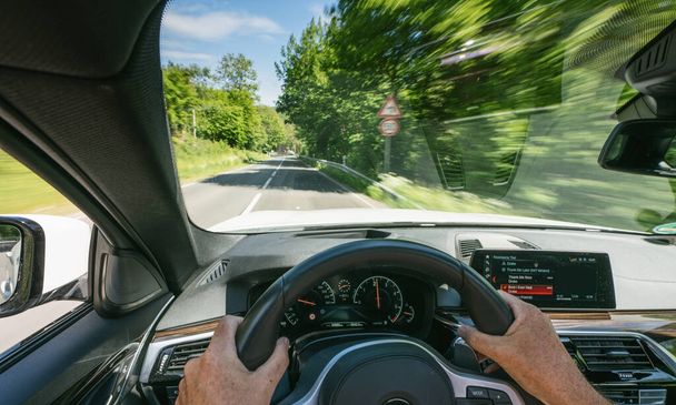 hands of car driver on steering wheel, road trip, driving on highway road - Fotoğraf, Görsel