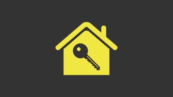 Casa amarilla con icono clave aislado sobre fondo gris. El concepto de llave en mano de la casa. Animación gráfica de vídeo 4K - Metraje, vídeo