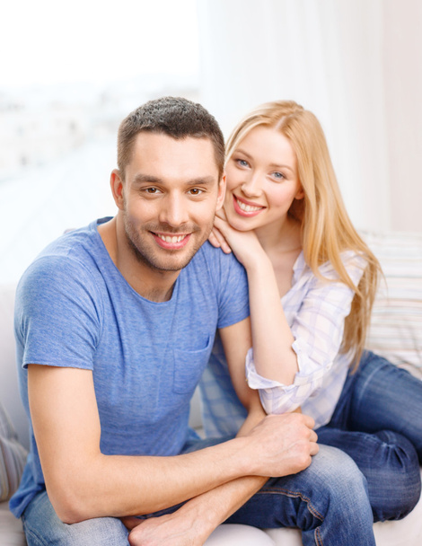 Smiling happy couple at home - Foto, imagen
