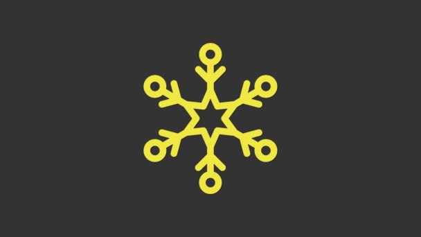 Ikona žluté vločky izolovaná na šedém pozadí. Grafická animace pohybu videa 4K - Záběry, video