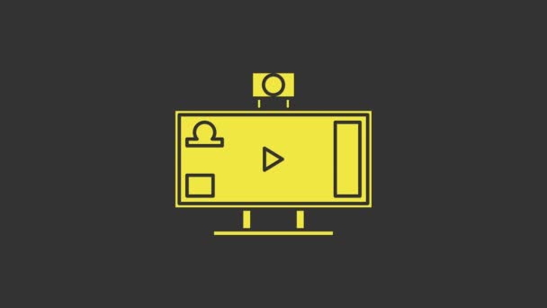 Žlutý Live streaming online videohry hrát ikonu izolované na šedém pozadí. Grafická animace pohybu videa 4K - Záběry, video