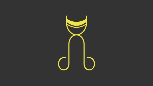 Icono de rizador de pestañas amarillas aislado sobre fondo gris. Señal de maquillaje. Animación gráfica de vídeo 4K - Imágenes, Vídeo