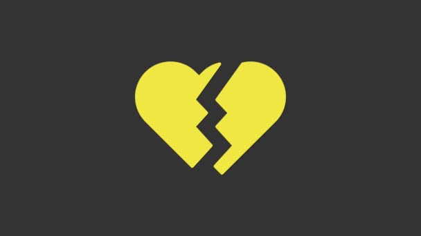 Желтое разбитое сердце или икона развода изолированы на сером фоне. Символ любви. День Святого Валентина. Видеографическая анимация 4K - Кадры, видео