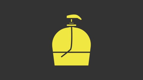 Gelbe Flasche flüssige antibakterielle Seife mit Spendersymbol auf grauem Hintergrund. Desinfektion, Hygiene, Hautpflege. 4K Video Motion Grafik Animation - Filmmaterial, Video