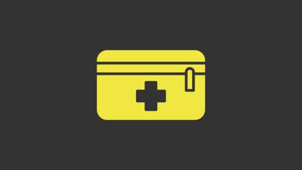 Ícone amarelo do kit de primeiros socorros isolado no fundo cinza. Caixa médica com cruz. Equipamento médico de emergência. Conceito de saúde. Animação gráfica em movimento de vídeo 4K - Filmagem, Vídeo