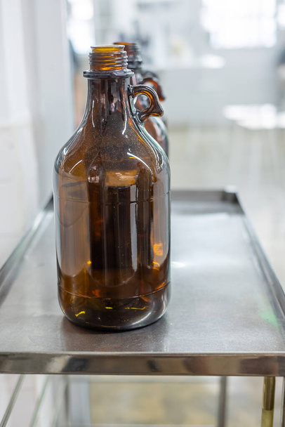 Solvent Bottle in Chemical laboratory. Waste management, hazard, recycle and pollution concept - Photo, Image