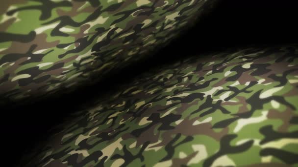 Groene camouflage patroon achtergrond. Militair uniform concept. Abstracte lijn en golf textuur. Lusanimatie. - Video