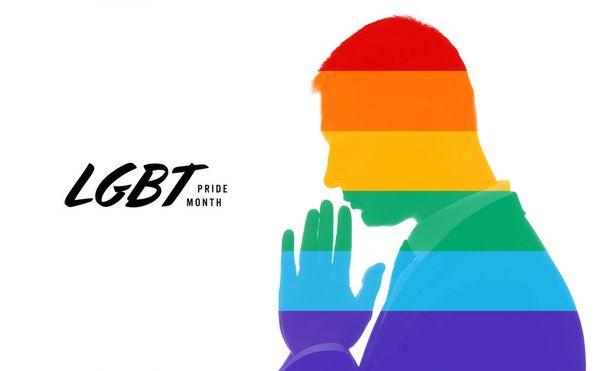 Silueta arco iris del hombre orante sobre fondo blanco con texto MES DE Orgullo LGBT - Foto, imagen