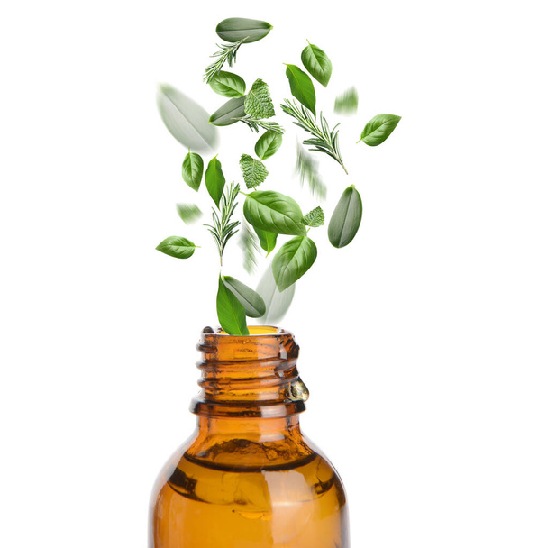 Bottle of herbal remedy on white background - Fotoğraf, Görsel