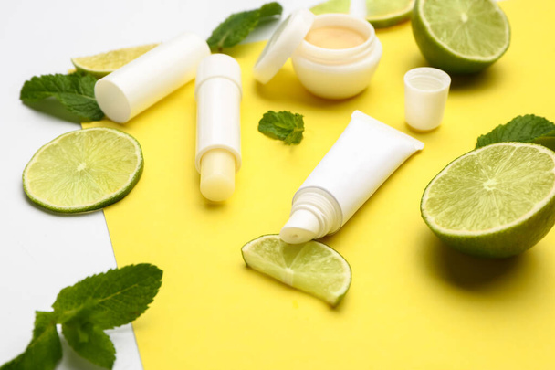 Natural lip balms with lime on color background - Photo, Image
