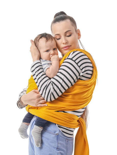 Young mother with little baby in sling on white background - Fotografie, Obrázek