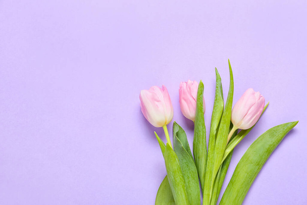 Beautiful tulip flowers on color background - Valokuva, kuva