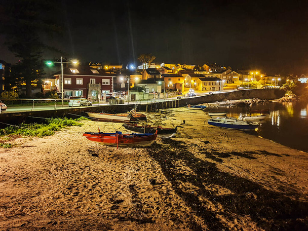 Naval beach and neighborhood in Arousa Island at night - Photo, Image