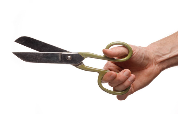 Scissors in the hands of a man and a tailor on a white background isolate - Foto, Imagem