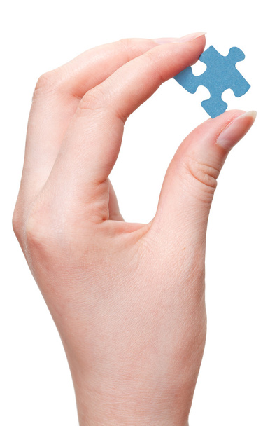 weiblicher Arm mit blauem Puzzleteil - Foto, Bild