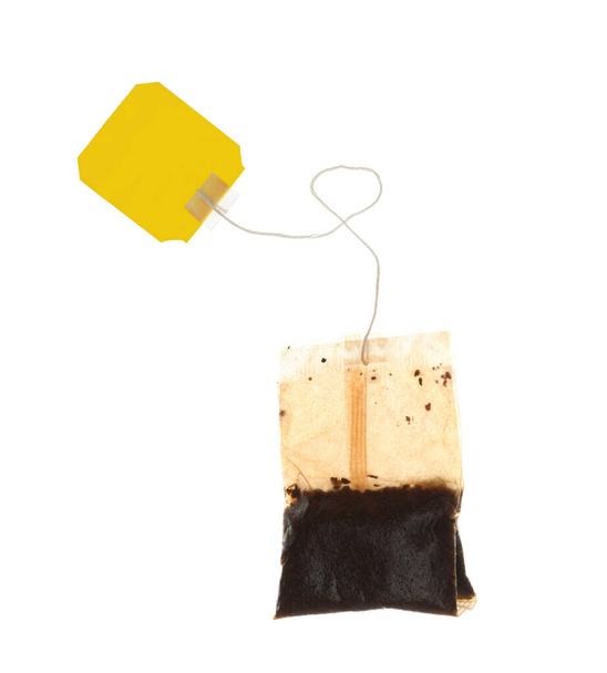 Used tea bag with tag isolated on white - Fotografie, Obrázek