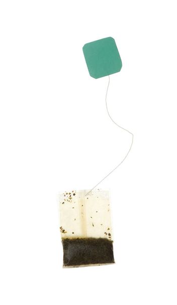 Used tea bag with tag isolated on white - Fotografie, Obrázek