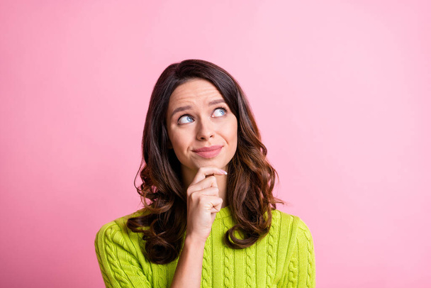 Photo of pensive intelligent lady look up empty space finger chin wear green sweater isolated pink color background - Φωτογραφία, εικόνα
