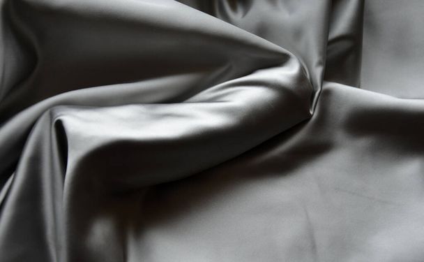 erect male penis under a satin cloth blanket. gift vibrator covered chastely. the usual Valentine's gift and a frequent offer of sex shops. The greatness of male nature will be replaced by a silicone dildo, a topic for conversation and bed games - Zdjęcie, obraz