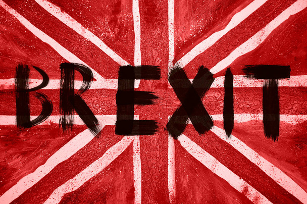 Het woord BREXIT met penseelstreken op de Britse vlag van dichtbij - Foto, afbeelding