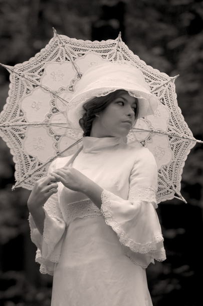 The lady under an umbrella - Photo, image