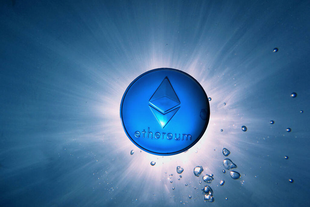 blue ether coin from ethereum with sun underwater bubbles - Photo, Image