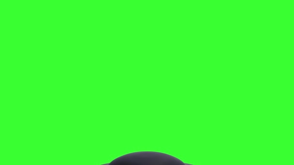 緑色の画面でのUFOの転移。緑の画面の背景に隔離されたエイリアンの空飛ぶ円盤 - 映像、動画