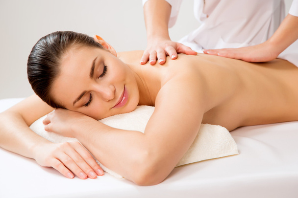 Woman having massage on back - Fotó, kép