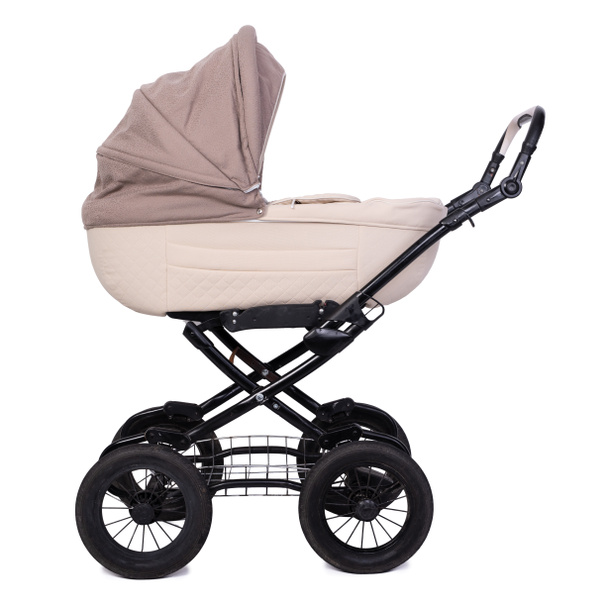 Carro de bebé, cochecito sobre ruedas aisladas sobre fondo blanco - Foto, imagen
