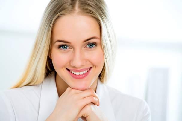 Young business woman smiling - Фото, изображение