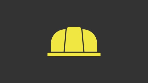 Žlutá Bezpečnostní helma pracovníka ikona izolované na šedém pozadí. Pojištění. Zabezpečení, bezpečnost, ochrana, koncepce ochrany. Grafická animace pohybu videa 4K - Záběry, video