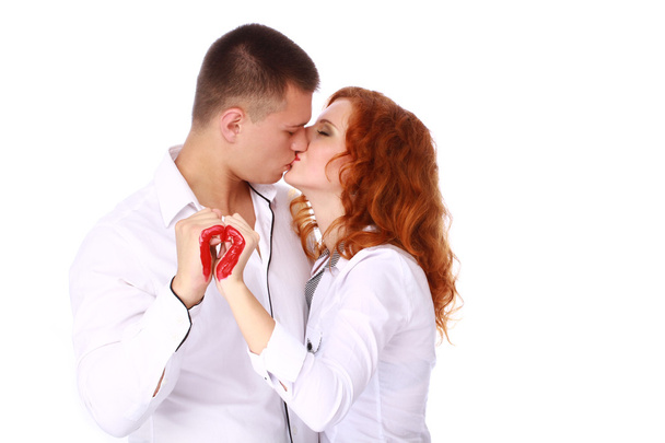 Young happy couple in love kissing on white background - 写真・画像