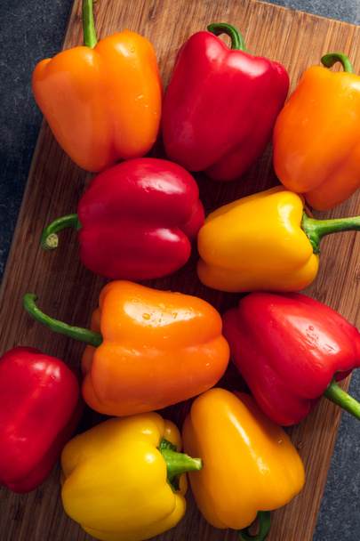 Orange, red and yellow bell peppers - Photo, Image
