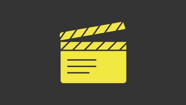 Yellow Movie clapper icon isoliert auf grauem Hintergrund. Filmklappbrett. Klappschild. Kinoproduktion oder Medienindustrie. 4K Video Motion Grafik Animation - Filmmaterial, Video