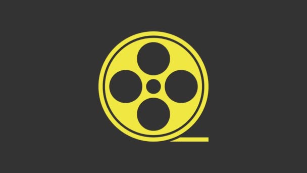 Ícone de bobina de filme amarelo isolado em fundo cinza. Animação gráfica em movimento de vídeo 4K - Filmagem, Vídeo