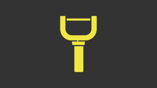 Żółta ikona Peelera odizolowana na szarym tle. Nóż do czyszczenia warzyw. Przedmiot kuchenny, urządzenie. 4K Animacja graficzna ruchu wideo - Materiał filmowy, wideo