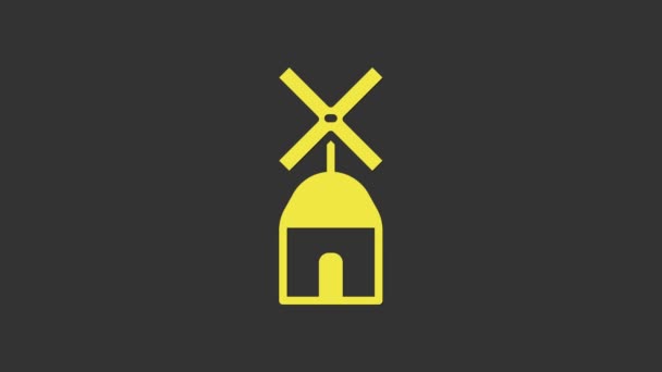 Icono del molino de viento amarillo aislado sobre fondo gris. Animación gráfica de vídeo 4K - Metraje, vídeo