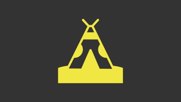 Icône traditionnelle indienne jaune tipi ou wigwam isolé sur fond gris. Une tente indienne. Animation graphique de mouvement vidéo 4K - Séquence, vidéo