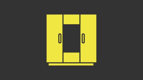 Gele kledingkast pictogram geïsoleerd op grijze achtergrond. 4K Video motion grafische animatie - Video