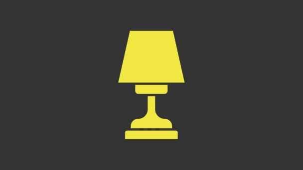 Ikona żółtej lampy stołowej izolowana na szarym tle. 4K Animacja graficzna ruchu wideo - Materiał filmowy, wideo