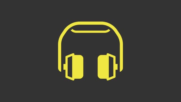 黄色のヘッドフォンアイコンは灰色の背景に隔離されています。イヤフォン。音楽、サービス、コミュニケーション、オペレーターの話を聞くためのコンセプト。4Kビデオモーショングラフィックアニメーション - 映像、動画