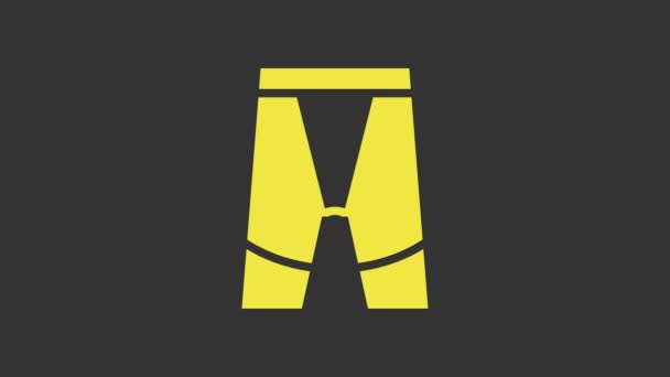 Short cycliste jaune icône isolée sur fond gris. Animation graphique de mouvement vidéo 4K - Séquence, vidéo