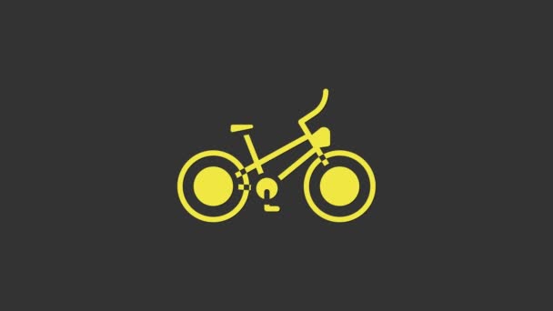Ícone de bicicleta amarelo isolado no fundo cinza. Corrida de bicicleta. Desporto extremo. Equipamento desportivo. Animação gráfica em movimento de vídeo 4K - Filmagem, Vídeo