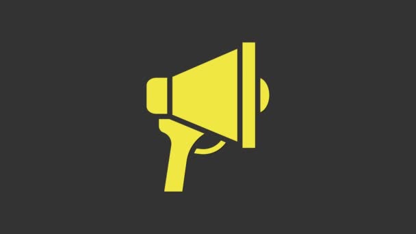 Żółta ikona megafonu na szarym tle. Znak mówcy. 4K Animacja graficzna ruchu wideo - Materiał filmowy, wideo