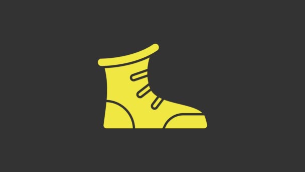 Žlutá ikona sportovní boxerské boty izolované na šedém pozadí. Zápasnické boty. Grafická animace pohybu videa 4K - Záběry, video