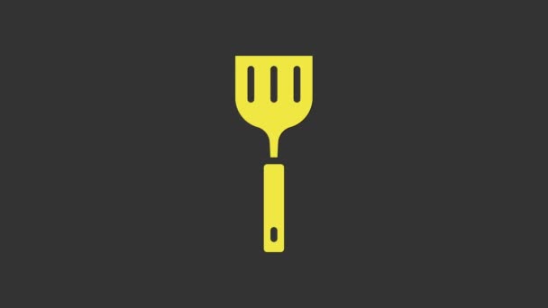Icône Spatule jaune isolée sur fond gris. Icône de spatule de cuisine. Signe de spatule de barbecue. Barbecue et outil de grill. Animation graphique de mouvement vidéo 4K - Séquence, vidéo