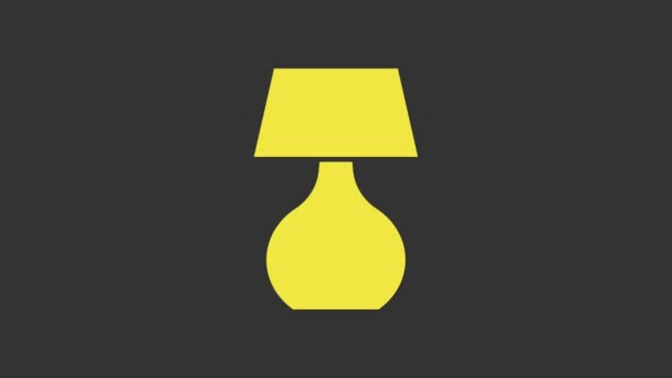 Icono de lámpara de mesa amarilla aislado sobre fondo gris. Lámpara de escritorio. Animación gráfica de vídeo 4K - Metraje, vídeo
