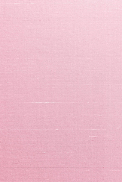 シルクコットンリネン混紡生地の質感の背景に薄い甘い紫色のピンク色  - 写真・画像