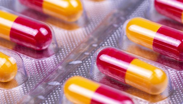 medical pills, antiviral drugs, capsules, blister packaging closeup, macro - Photo, Image